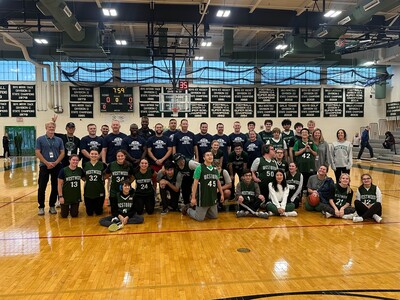 Westwood Police Officers Tip Off Against the WHS Unified Basketball Team